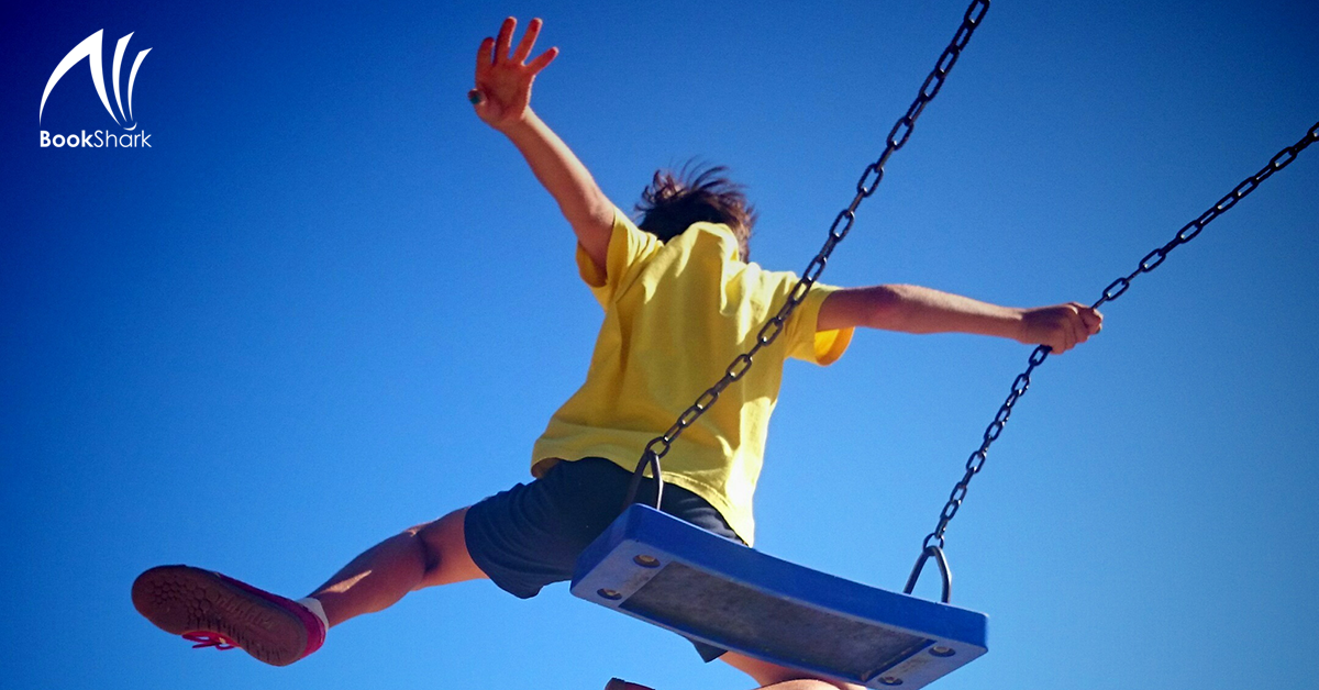 a child leaps from a swing seat
